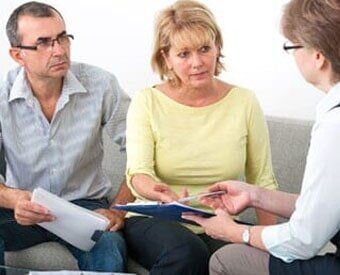 Family consulting an attorney